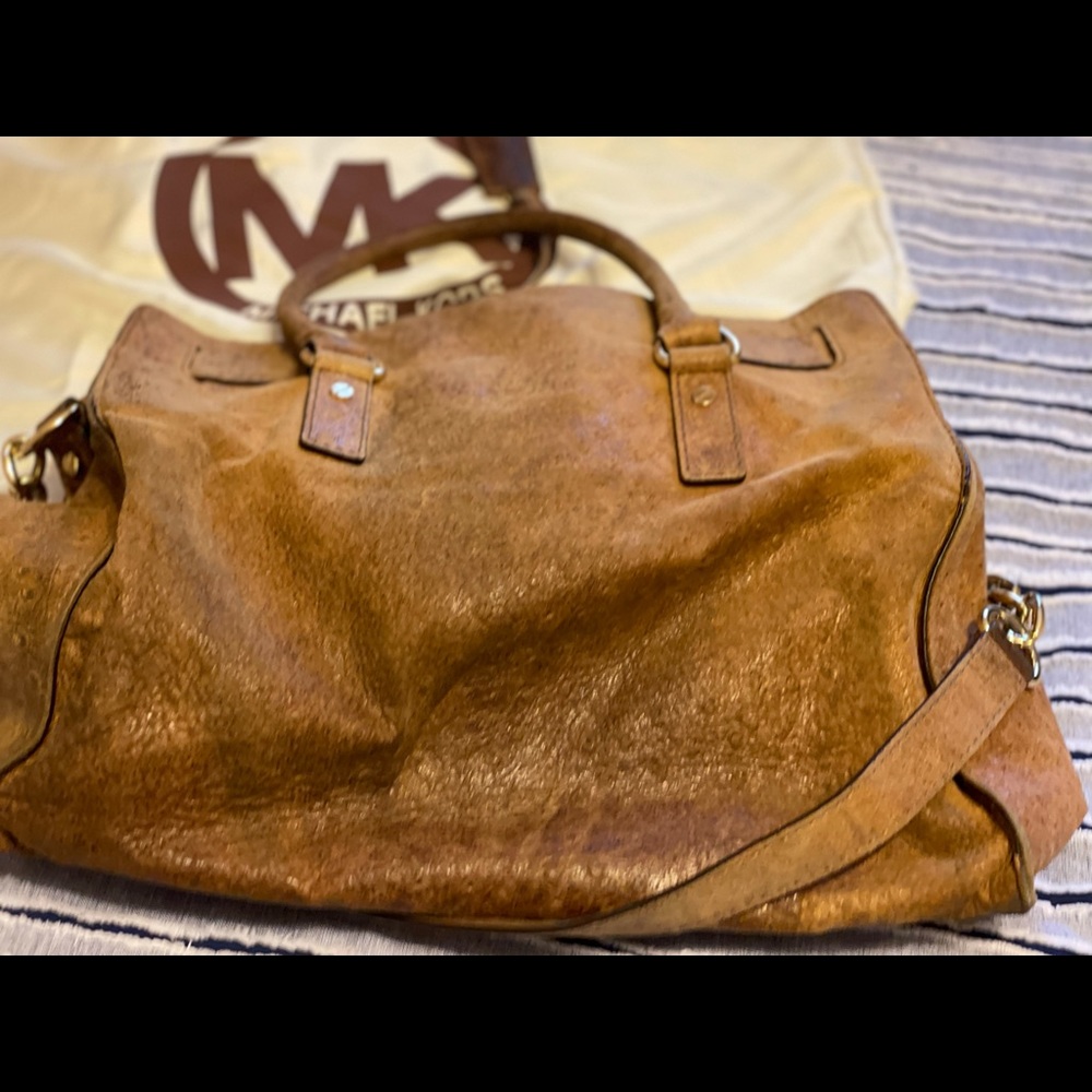 Michael Kors leather Ostrich purse. 13.5” Tall x 4.5” wife. 12” in Length.